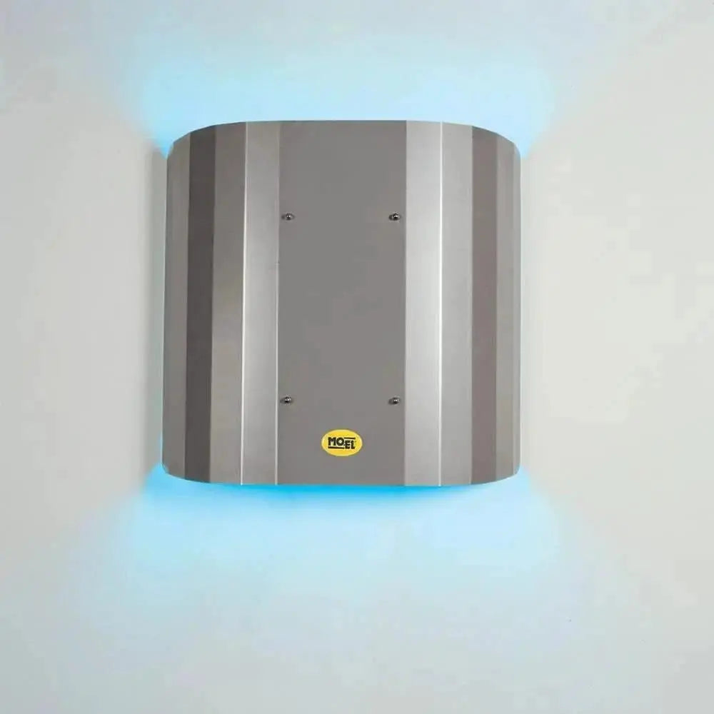 Mo-El Butterfly 700 insect killer, 40 W UV-A, gray metal housing with blue UV glow and Mo-El logo. UAE