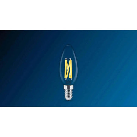 Philips MAS LEDCandle E14 bulb, 3.4W (40W eq), clear glass with warm-glow filament on blue background UAE