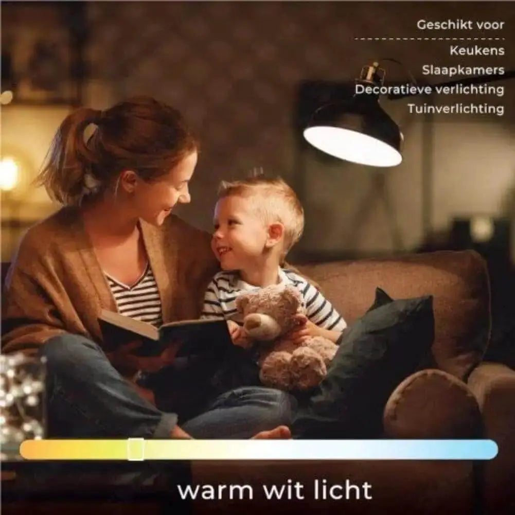 Philips CorePro LEDcapsule G4 2W 12V warm white bulb in a cozy living room scene with mother and child under a pendant lamp U