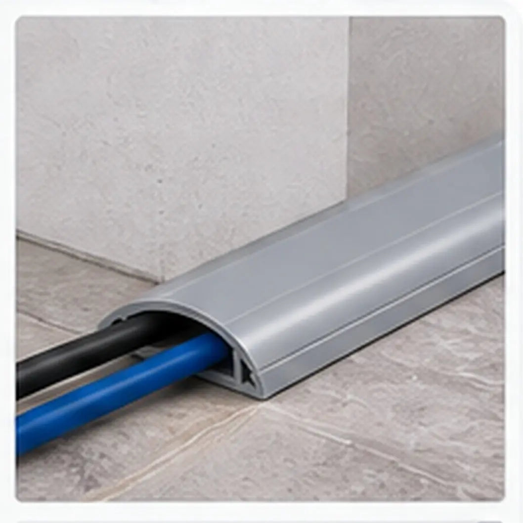 Deluxe 10x35mm Grey PVC floor trunking installed over floor cables