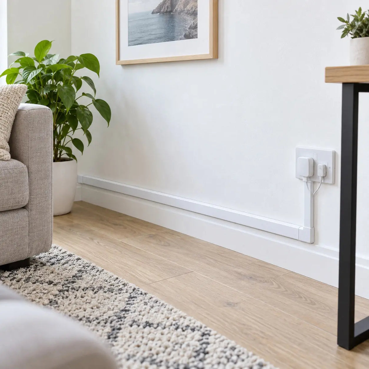 Deluxe 10x10mm PVC self-adhesive cable trunking installed along an interior wall