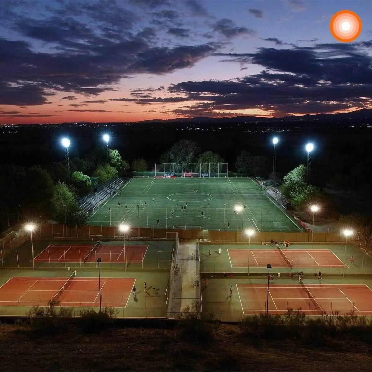 Ledvance LED Eco Lite Floodlight 50W G2 IP65 mounted on tall poles lighting a dusk sports complex UAE