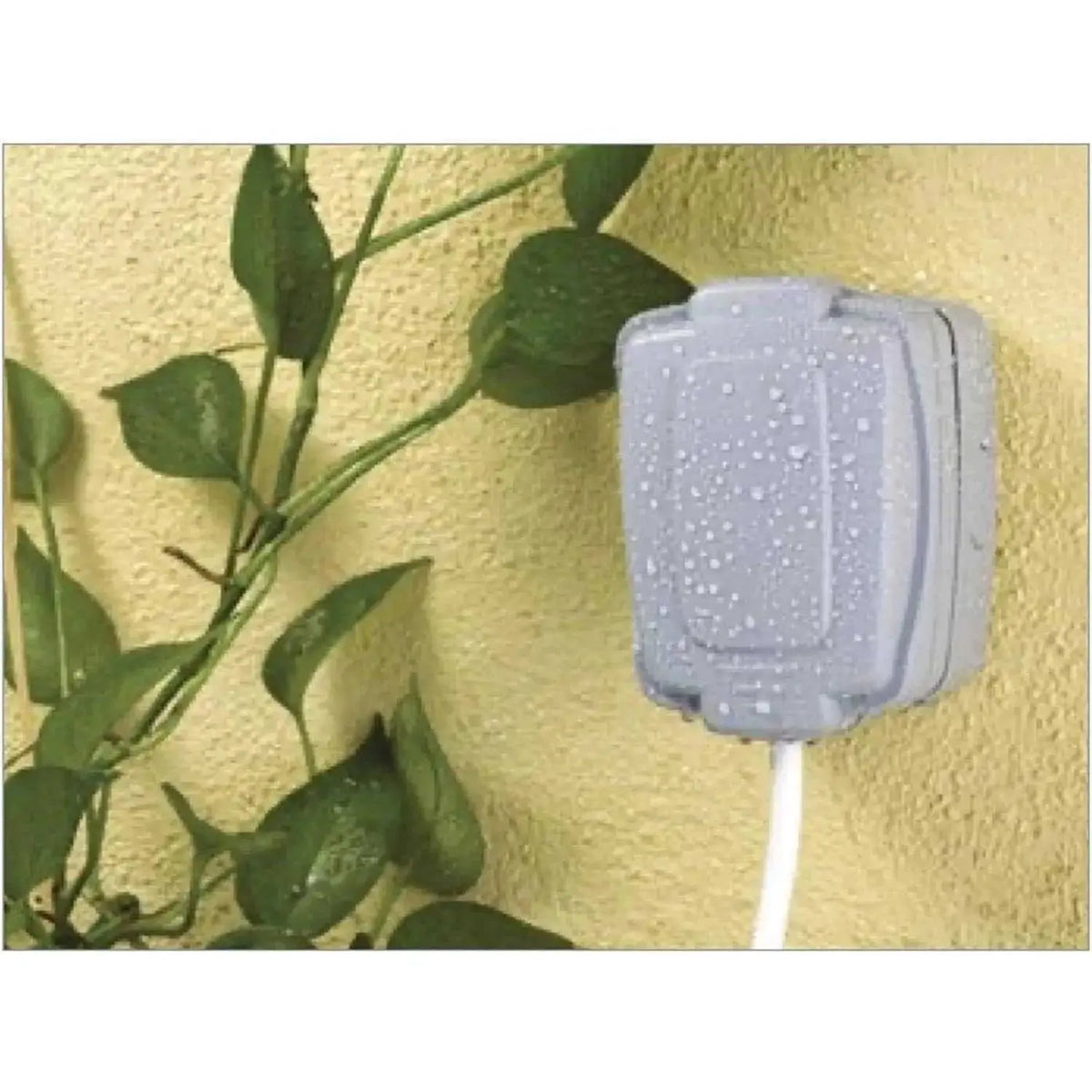 MK Electric Masterseal 3-Gang 2-Way weatherproof switch enclosure, grey plastic mounted on an outdoor wall with cable entry. 