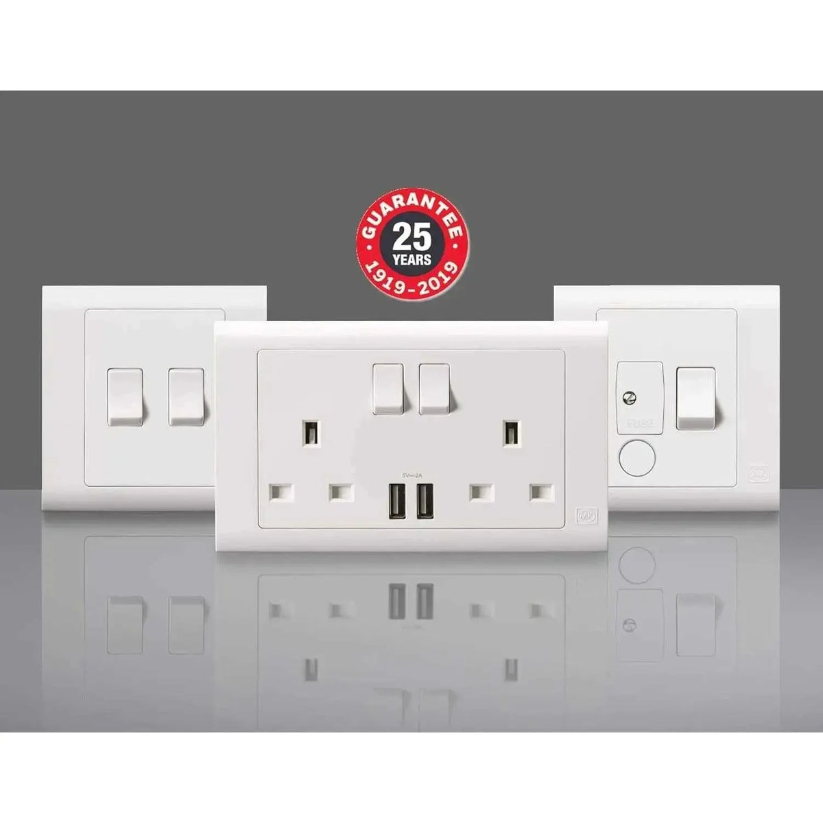 MK Electric MV2747WHI 2G 13A switched socket with USB ports on a white wall plate, front view, three plates shown UAE