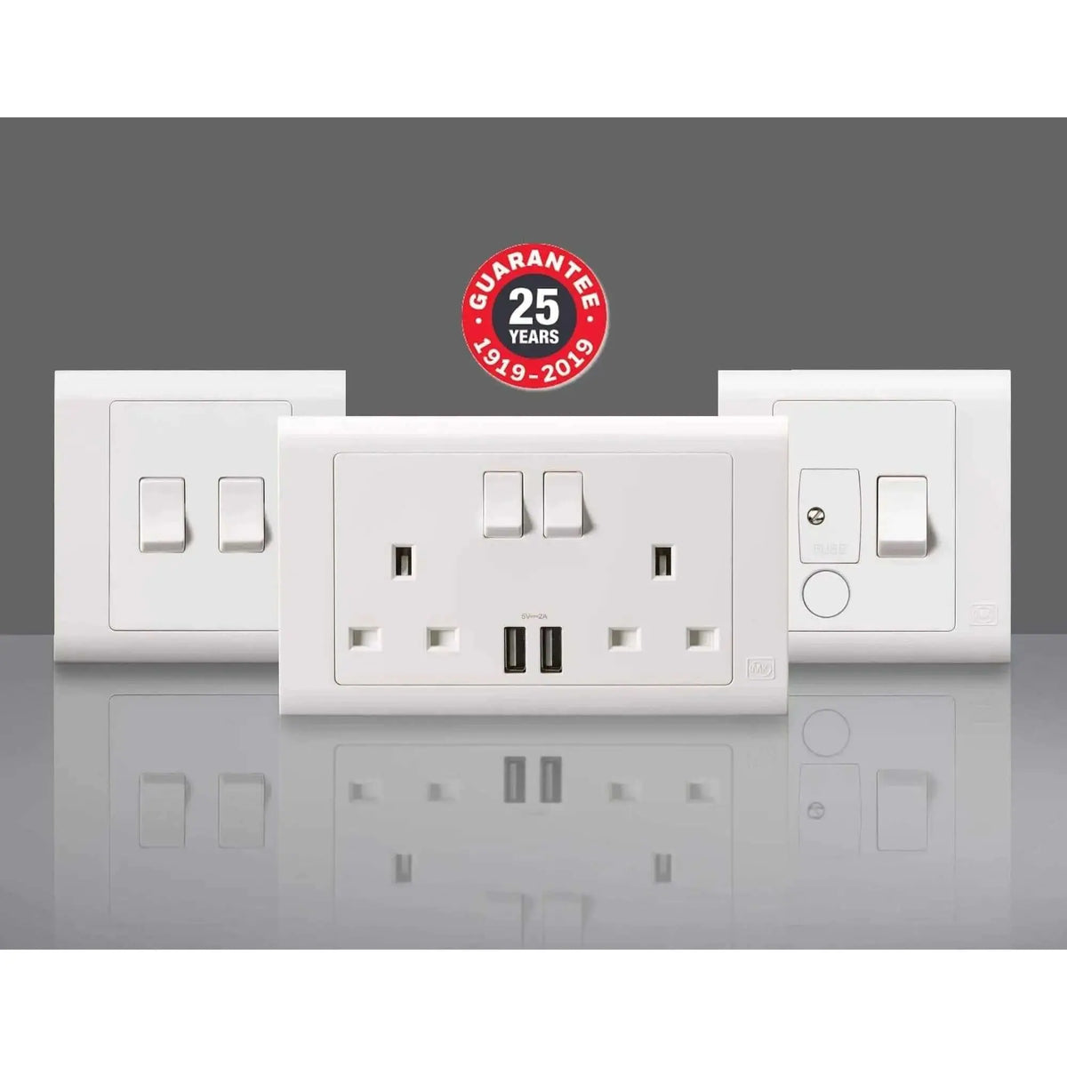 MK Essentials 10AX 1G intermediate switch with wide rocker on white multi-gang faceplate by MK Electric UAE